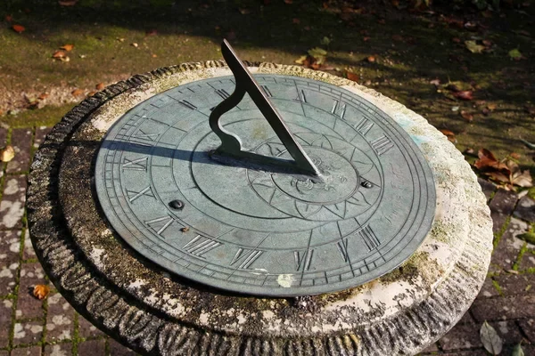 depositphotos_314098896-stock-photo-horizontal-garden-sundial.webp